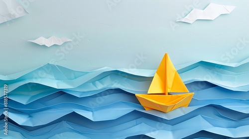 Origami yellow sailing boat on a sea made with blue paper