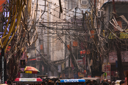 Maze of electrical wires at a street of Old Delhi, India.

