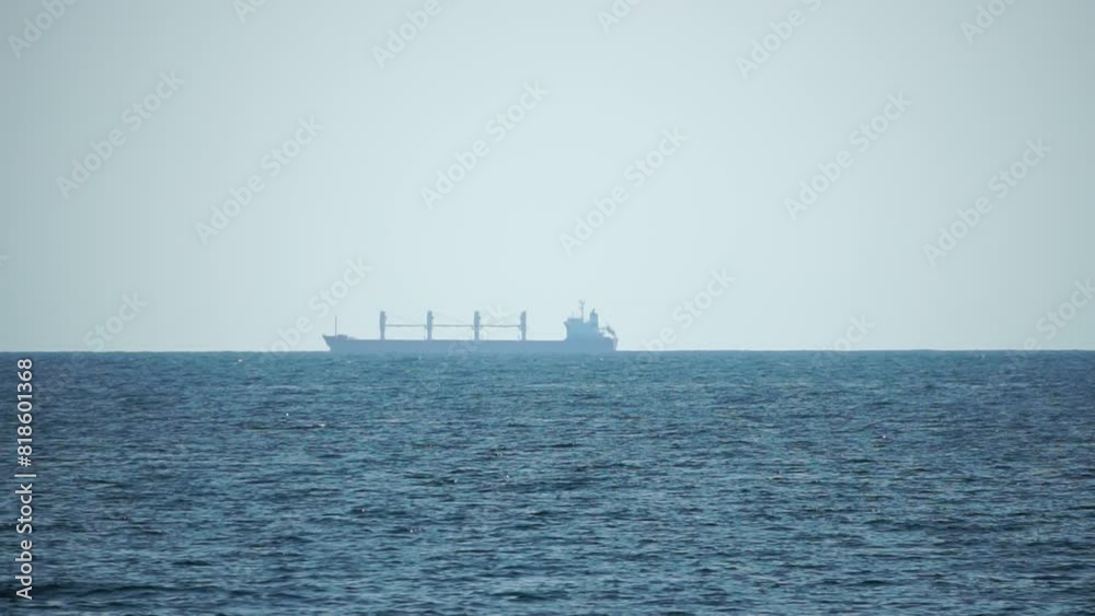 Cargo and dredging industrial ships sailing in to sea horizon. One large cargo ship grain carrier tanker in sea on sunny day. Transport, sea freight, sea transportation of cargo. Aerial view Cargo and dredging industrial ships sailing in to sea horizon. One large cargo ship grain carrier tanker in sea on sunny day. Transport, sea freight, sea transportation of cargo. Aerial view