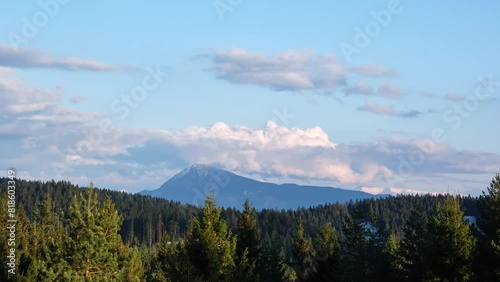 Time Lapse video 4K. Mountain Velky Choc with fluffy clouds sky, Slovakia. photo
