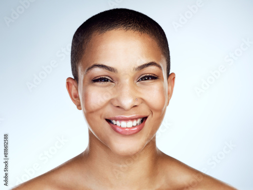 Portrait, smile and skincare with natural black woman in studio on blue background for wellness. Aesthetic, beauty and cosmetics with face of happy model with clear skin for dermatology or vitamin c