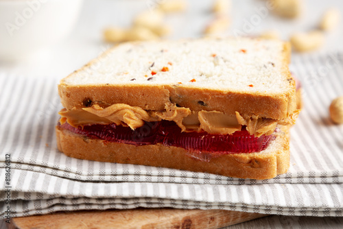 Homemade Peanut Butter and Jelly Sandwich, side view. Close-up.