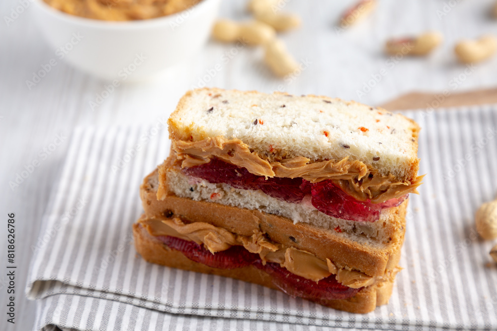 Homemade Peanut Butter and Jelly Sandwich, low angle view. Close-up. Homemade Peanut Butter and Jelly Sandwich, low angle view. Close-up.