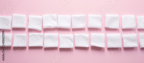 Wallpaper Mural A flat lay of several clean cotton pads arranged on a pink background providing ample space for adding text Torontodigital.ca