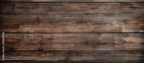 A textured copy space image of weathered wooden planks