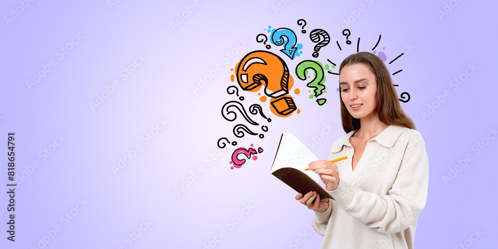 Young businesswoman write in notebook, set of question marks copy space Young businesswoman write in notebook, set of question marks copy space