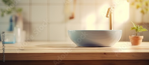 A blurred bathroom serves as the background for a table top offering ample copy space for images