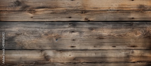 Aged weathered wooden board with a vintage rustic appearance perfect for creating a nostalgic and timeless atmosphere Ideal for use as a background in photography or graphic design projects