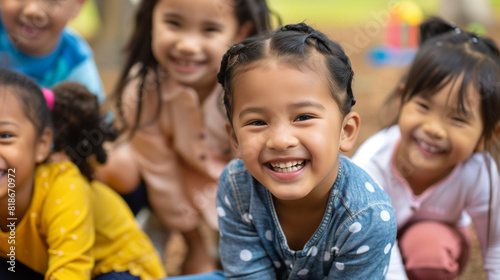 A joyful group of multiethnic children smiling and playing together outdoors, symbolizing diversity and unity. Captured with full depth of field, dynamic poses, and cinematic lighting.