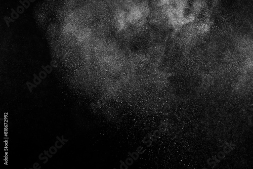 Grunge black and white texture background. Dark textured pattern. Abstract dust overlay. Light powder explosion.	