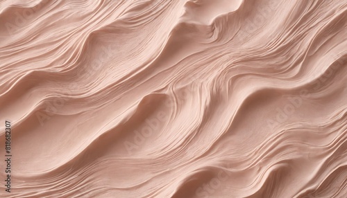 A pink and white sandy beach with a wave pattern