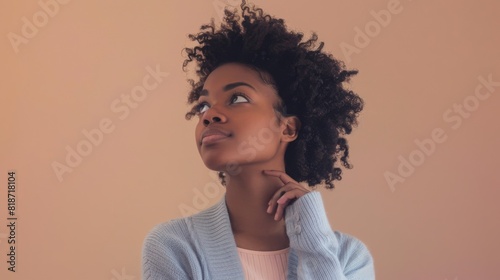 Thoughtful Woman with Afro Hairstyle