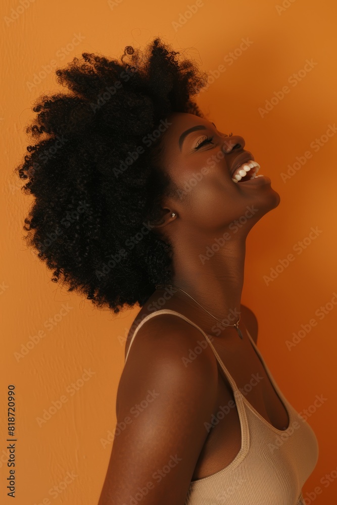 Cosmetics, confident, happy black woman with afro and natural beauty on brown studio background. Makeup, laughter, African American girl pride, and clear skin. Cosmetics, confident, happy black woman with afro and natural beauty on brown studio background. Makeup, laughter, African American girl pride, and clear skin.
