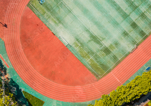 Fotografija Aerial view of a football field with an empty running track