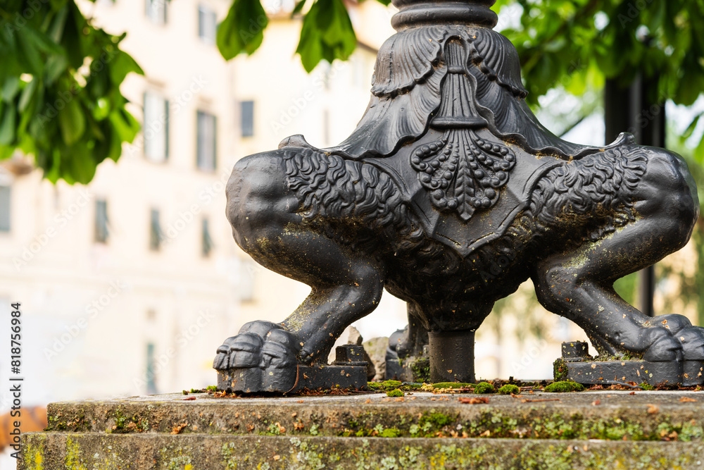ornate lion leg sculpture with intricate details