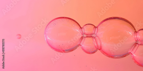 Bubbles on a pink background,Pink collagen serum bubbles. Cosmetic essence., banner