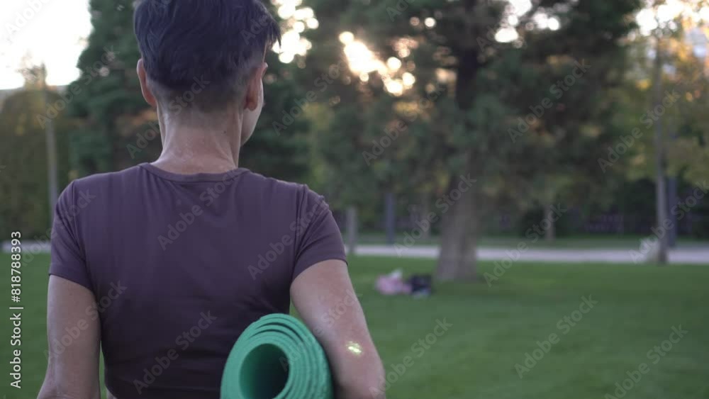 Mature adult woman with yoga mat outdoors. Active aging and lifestyle in retirement Mature adult woman with yoga mat outdoors. Active aging and lifestyle in retirement