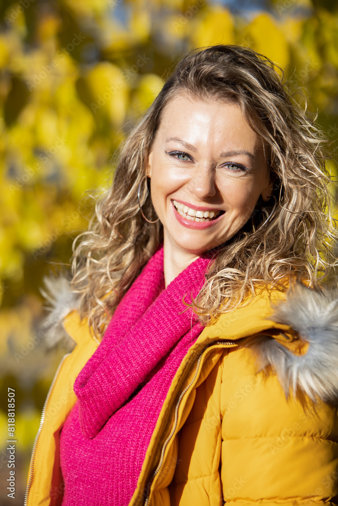 Happy woman enjoying autumn life in the nature Happy woman enjoying autumn life in the nature