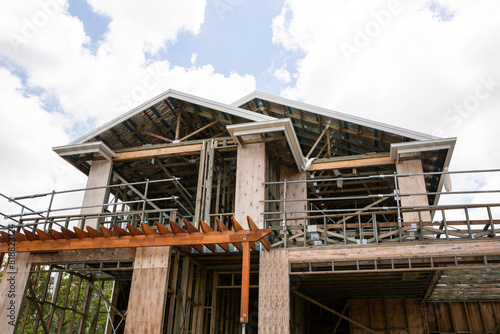 timber framed two storey house under construction