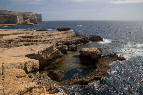 Photography Beautiful shot of stunning rocky landscape surrounding Dwejra Bay, Malta
