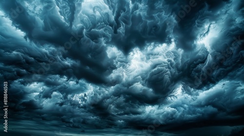 Stormy atmosphere with dense cumulus clouds covering the sky © tino