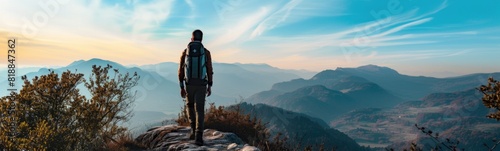 Person with a backpack walking on a mountain. Travel background. Banner
