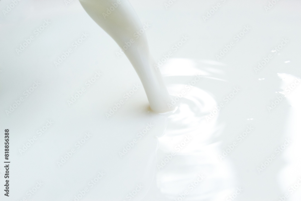 Close up of pouring white milk Close up of pouring white milk