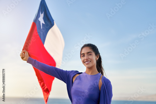 Cuadro en lienzo head shot portrait beautiful chilean woman holding a flag of Chile outdoors against blue sky, celebration and patriotism concept