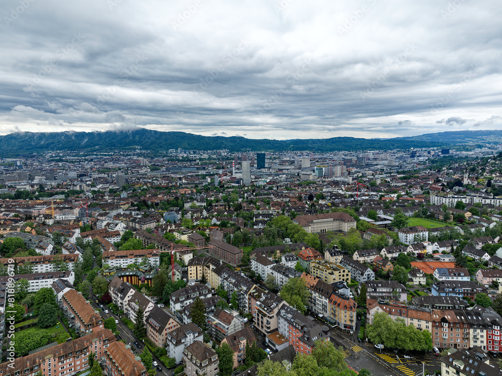 Aerial view of Swiss City of Zürich with cityscape and skyline on a cloudy spring day. Photo taken May 17th, 2024, Zurich, Switzerland. Aerial view of Swiss City of Zürich with cityscape and skyline on a cloudy spring day. Photo taken May 17th, 2024, Zurich, Switzerland.