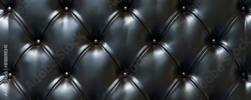 Black leather upholstery, abstract textured background
