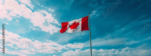 Flag of Canada on sky background in close-up fluttering in wind symbol of national borders freedom Canada flag on flagpole exemplifies patriotism uniqueness. Canada flag represents national identity. photo