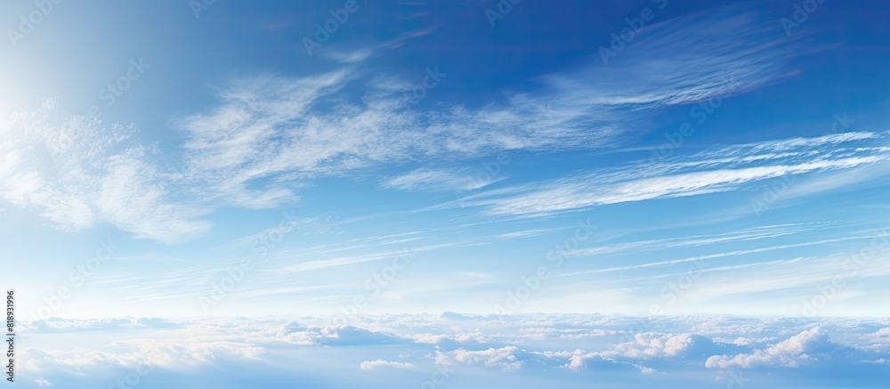 Panoramic format image showcasing the blue sky adorned with contrails leaving traces across the vast expanse Copy space image