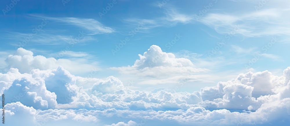 The sky is filled with an abundance of small white clouds creating a picturesque scene for a copy space image The sky is filled with an abundance of small white clouds creating a picturesque scene for a copy space image