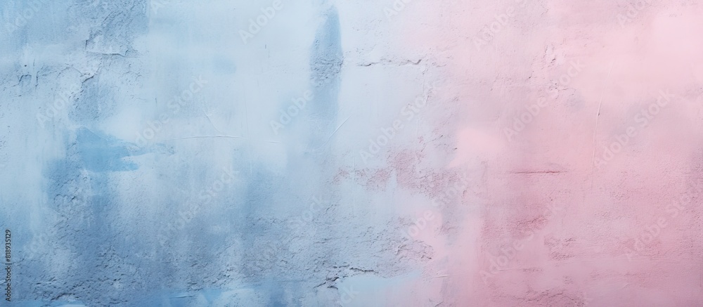 The wall has a gradient texture with light pink and blue colors The rough surface is textured with visible spots The image has copy space