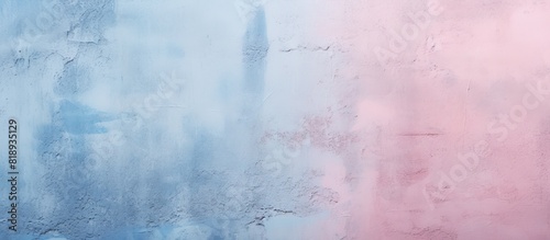 The wall has a gradient texture with light pink and blue colors The rough surface is textured with visible spots The image has copy space