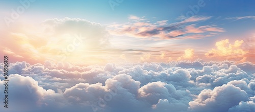 A captivating cloudscape with ornamental clouds and a dramatic sky illuminated by soft sunlight This panoramic image provides a perfect texture and background for graphic resources design or copy spa photo