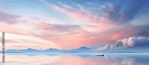Minimalistic image featuring a breathtaking sunrise with picturesque skies clouds serene landscapes calm seas and people perfect for copy space #818937180