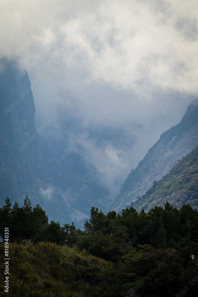 Rain clouds over Kinabalu Mountain in Sabah Malaysia Rain clouds over Kinabalu Mountain in Sabah Malaysia