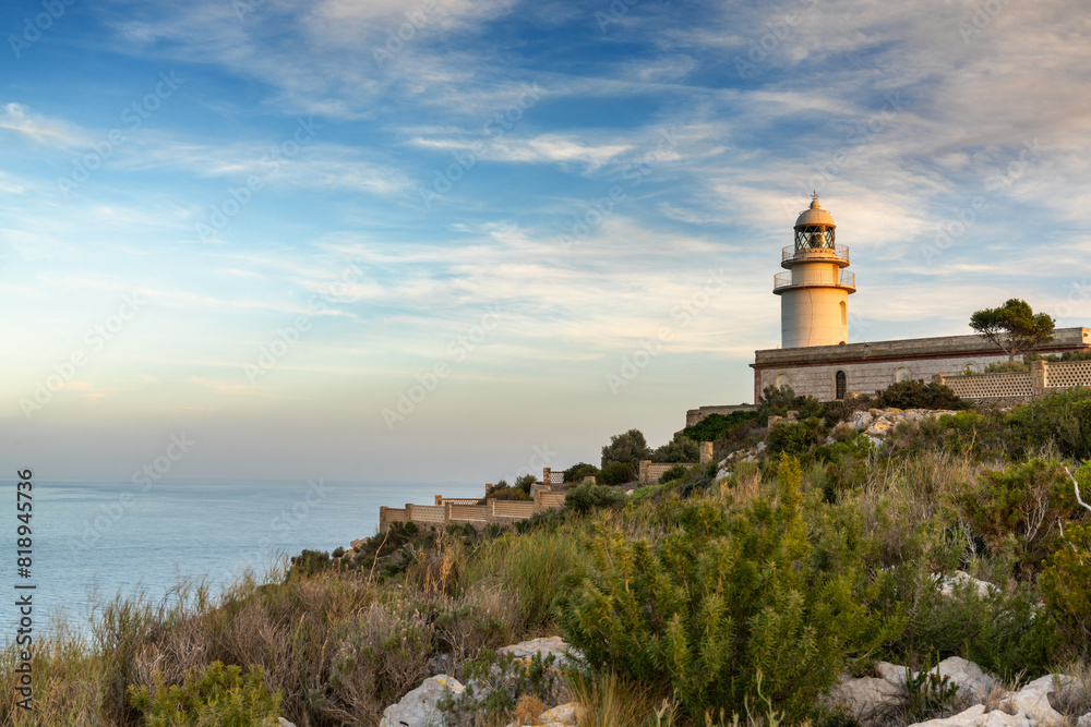 view of the Cap de Sant Antoni Lighthouse in Alicante Province in warm evening light view of the Cap de Sant Antoni Lighthouse in Alicante Province in warm evening light
