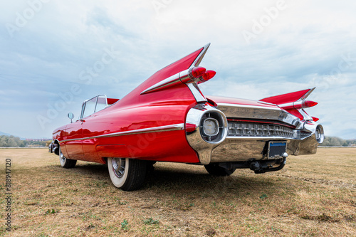 Side view of a classic american car from the fifties. Low angle view