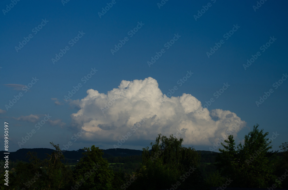 Cumulus clouds against blue skies in Germany Cumulus clouds against blue skies in Germany