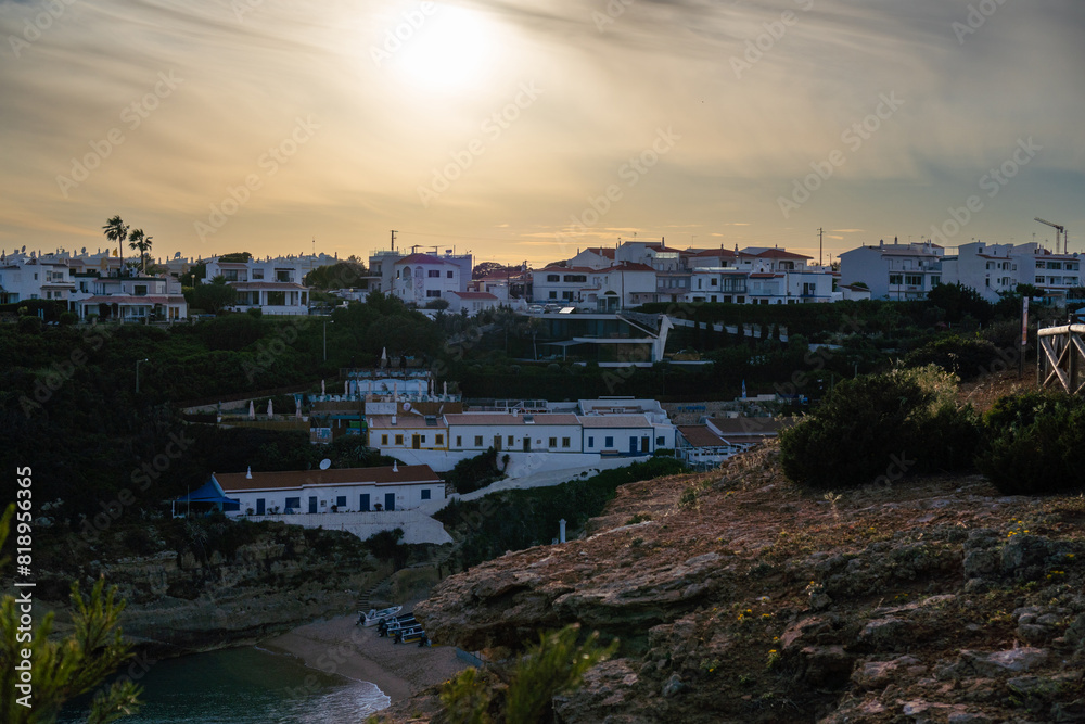 Fototapeta premium Benagil Beach (Praia de Benagil) is a magnificent beach east of Carvoeiro. Sunset. Sunny day.