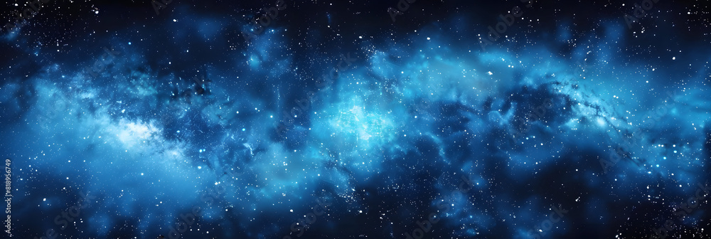 Obraz premium An electric blue galaxy with a multitude of stars twinkling in the background, resembling a midnight sky. The pattern of gas and darkness creates a mesmerizing meteorological phenomenon in space