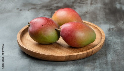 Mango on wood plate  photo