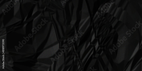 Black crumpled paper texture sheet background. Wrinkled paper texture. Abstract old rough blank black crumpled paper texture. 