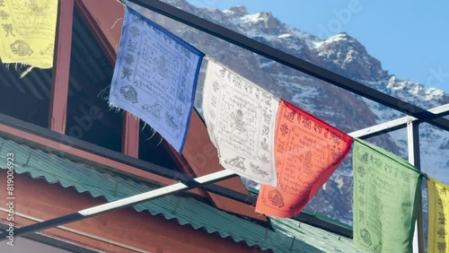 09-02-2024; Colorful Buddhist Flags Fluttering outside of House at Tabo , Spiti. photo