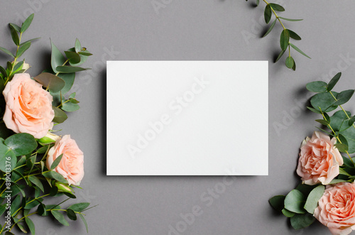 Blank invitation or save the date card mockup with fresh roses flowers