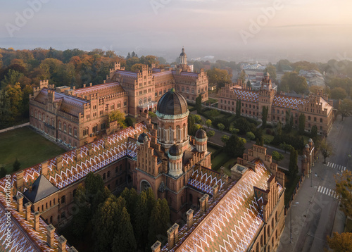 Aerial view of Yury Fedkovych national University in Chernivtsi. Morning cityscape with foggy haze. Architectural monuments in western Ukraine photo