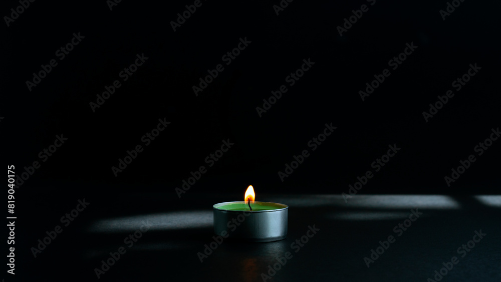 An aromatherapy candle that is lit to provide fragrance and feel relaxed. An aromatherapy candle that is lit to provide fragrance and feel relaxed.