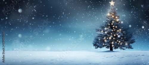 Winter background Christmas tree on snow and blue lights Christmas background with falling snowflakes copy space For a greeting or message about promotions and sales © Gular